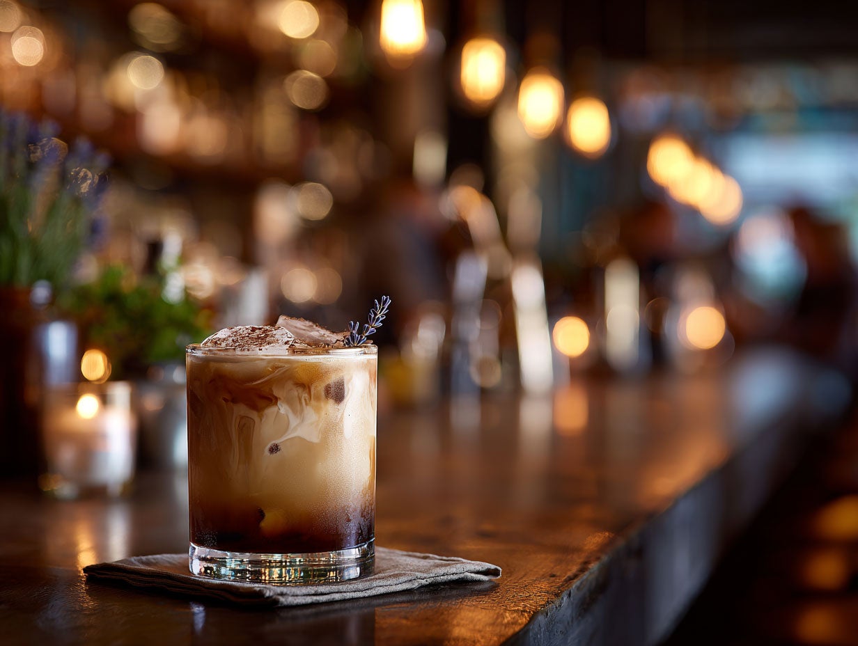 A white russian drink in cocktail glass. Created by AI. Edited by Pernod Ricard Sweden