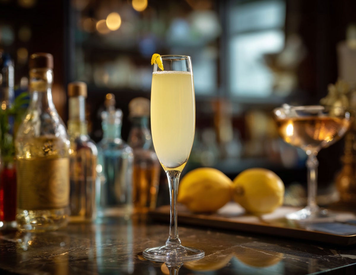 A light yellow drink served in a champagne glass. Created by AI. Edited by Pernod Ricard Sweden