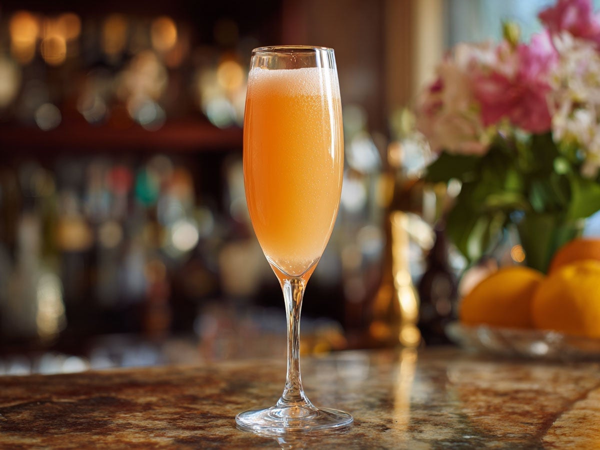 A Bellini drink served in flute glass. Created by AI. Edited by Pernod Ricard Sweden