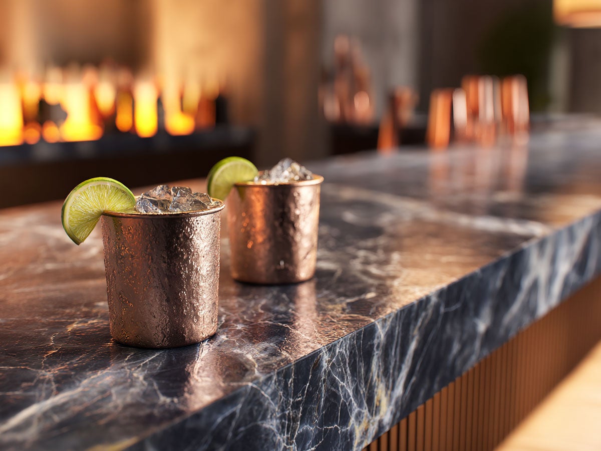 Two mule drink served on a bar. Created by AI. Edited by Pernod Ricard Sweden